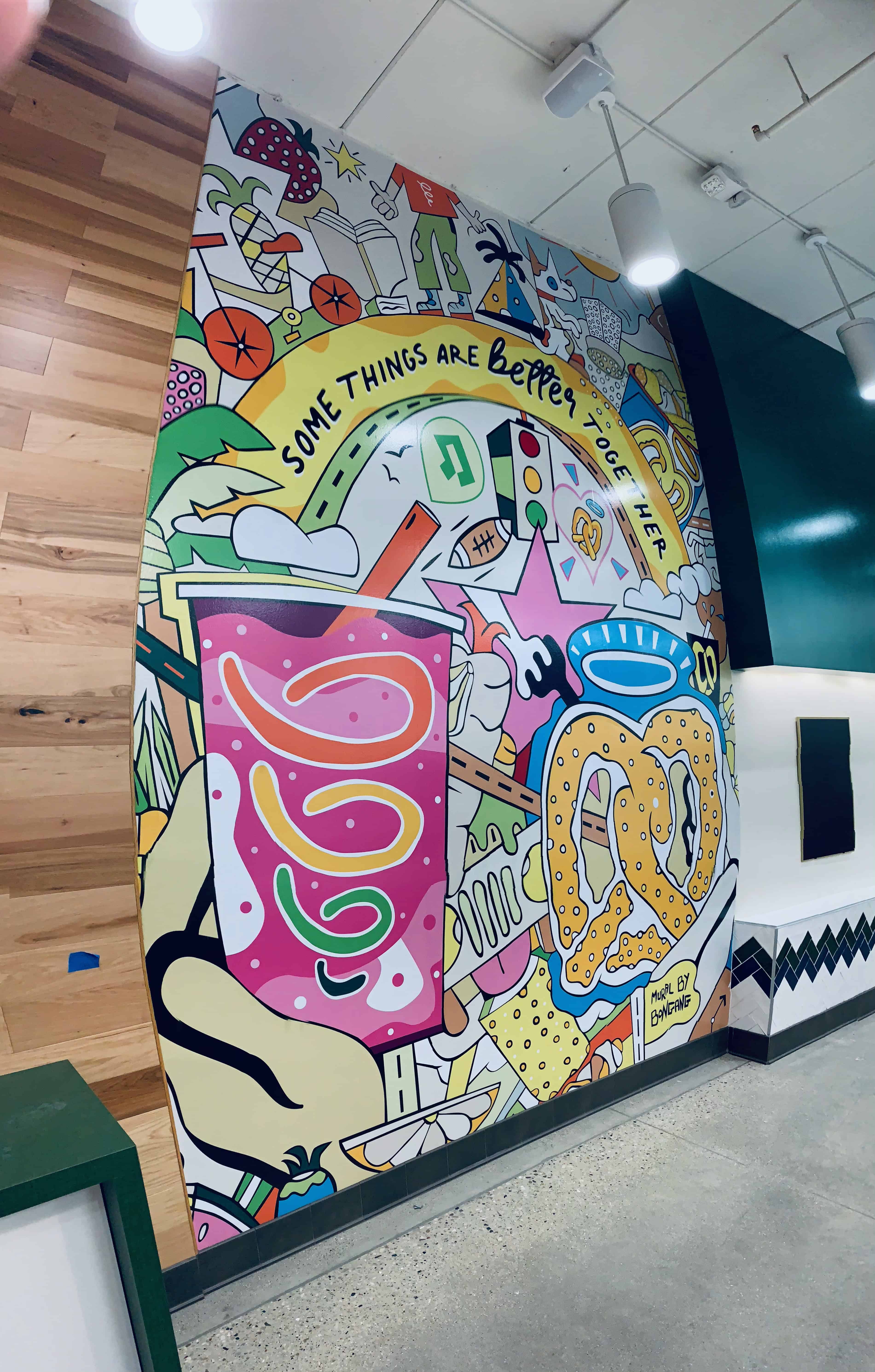Colorful wall mural featuring abstract art and playful designs for vibrant decor.